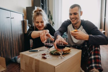 couple eating off box